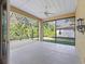 Bright and airy screened porch, perfect for relaxing outdoors at 16984 Se 109Th Ave, Summerfield, FL 34491