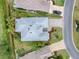 Aerial view showing house, landscaping, driveway, and location within neighborhood at 486 Troy Loop, The Villages, FL 32162