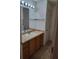 Bathroom with a vanity and tiled floors at 9215 Se 177Th Simons Ln, The Villages, FL 32162