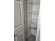 Functional closet space with wire shelving, offering practical storage solutions for linens and essentials at 9215 Se 177Th Simons Ln, The Villages, FL 32162