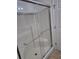 Shower with glass doors and stainless steel hardware at 9215 Se 177Th Simons Ln, The Villages, FL 32162