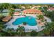 Community pool and clubhouse viewed from above at 5072 Neptune Cir, Oxford, FL 34484