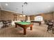 Community billiards room with two pool tables at 5072 Neptune Cir, Oxford, FL 34484