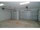 Three-car garage with automatic door openers offers plenty of parking and storage space at 2311 Juniper Berry Dr, Minneola, FL 34715