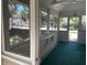 Inviting sunroom filled with natural light offering a cozy and relaxing space at 1010 S Grove St, Eustis, FL 32726