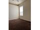 Bright bedroom with neutral carpeting and a window with blinds at 1332 Hunterman Lane, Winter Garden, FL 34787