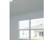 Bright bedroom with a large window overlooking the backyard at 5807 Wallis Ln, Saint Cloud, FL 34771