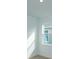 Bright bedroom with window and neutral wall colors at 5807 Wallis Ln, Saint Cloud, FL 34771