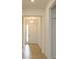 Light and airy entryway with tile floors and white door at 5807 Wallis Ln, Saint Cloud, FL 34771