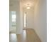 Bright entryway with tile floors and neutral-colored walls at 5807 Wallis Ln, Saint Cloud, FL 34771