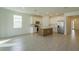 Modern kitchen with stainless steel appliances and an island at 5807 Wallis Ln, Saint Cloud, FL 34771