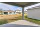 Covered patio overlooking a backyard at 5807 Wallis Ln, Saint Cloud, FL 34771