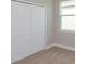 Spacious closet with double doors and neutral walls at 5820 Springer St, Saint Cloud, FL 34771