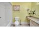 Full bathroom with tile floors, granite vanity, and shower-tub combo at 17548 Se 96Th Ave, Summerfield, FL 34491