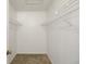 This walk-in closet features carpet and wire shelving at 17548 Se 96Th Ave, Summerfield, FL 34491