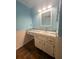 Bathroom with updated vanity and tiled floor at 14700 Se 94Th Ave, Summerfield, FL 34491