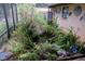 Screened patio featuring a lovely Koi pond at 14700 Se 94Th Ave, Summerfield, FL 34491