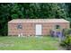 Large storage shed with wood siding at 14700 Se 94Th Ave, Summerfield, FL 34491