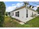 Well-maintained house exterior with vinyl siding, and a screened porch at 732 Angelita Ave, The Villages, FL 32159