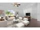 Bright living room boasts vaulted ceilings, comfortable seating, and large windows at 14853 Sw 26Th Ln, Ocala, FL 34481