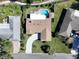 An aerial view showcases the home's layout, landscaping, and proximity to neighboring properties at 213 Stevenage Dr, Longwood, FL 32779