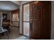 Inviting front entryway featuring a stylish wooden front door with glass insert at 213 Stevenage Dr, Longwood, FL 32779