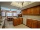 Classic kitchen with wood cabinetry and a breakfast nook bathed in natural light at 213 Stevenage Dr, Longwood, FL 32779