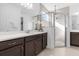 Elegant bathroom with double sinks, a large shower, and modern finishes at 30057 Island Club Dr, Tavares, FL 32778