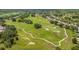 Golf course with winding cart paths and lush fairways at 25499 Hawks Run Ln, Sorrento, FL 32776