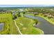 Stunning aerial view of a golf course community at 25499 Hawks Run Ln, Sorrento, FL 32776