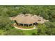 Unique home with circular design and beautiful landscaping at 25499 Hawks Run Ln, Sorrento, FL 32776