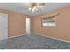 Bedroom featuring a window and a walk-in closet at 17574 Se 106Th Ave, Summerfield, FL 34491
