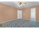 Bedroom featuring two closets and a window at 17574 Se 106Th Ave, Summerfield, FL 34491