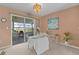 Charming dining area with sliding glass doors leading to an outdoor patio at 17574 Se 106Th Ave, Summerfield, FL 34491