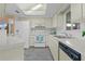 Bright kitchen with white appliances and ample counter space at 17574 Se 106Th Ave, Summerfield, FL 34491