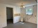 Spacious kitchen featuring a window and access to other rooms at 20621 Se Highway 42, Umatilla, FL 32784