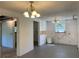Spacious kitchen featuring light fixtures and access to other rooms at 20621 Se Highway 42, Umatilla, FL 32784