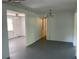 Bright living room featuring light fixtures and access to other rooms at 20621 Se Highway 42, Umatilla, FL 32784