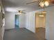 Bright living room featuring an ceiling fan and light fixtures at 20621 Se Highway 42, Umatilla, FL 32784