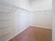 Large walk-in closet with wire shelving at 1338 Neuport Path, The Villages, FL 32163