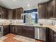 Gourmet kitchen with granite countertops, stainless steel appliances, and tile backsplash at 8830 Se 161St Pl, Summerfield, FL 34491
