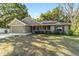 Single Gathering home with manicured front lawn, 2-car garage, sidewalk, and a tasteful, well-maintained exterior at 8566 Se 156Th Pl, Summerfield, FL 34491