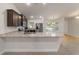 Modern kitchen features stainless appliances, granite counters, and ample cabinet space at 8566 Se 156Th Pl, Summerfield, FL 34491