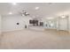 Open-concept living space with vaulted ceilings and an inviting atmosphere, perfect for entertaining at 8566 Se 156Th Pl, Summerfield, FL 34491