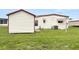 Spacious backyard with shed and grassy area at 1209 Apache Cir, Tavares, FL 32778