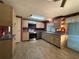 View of the kitchen from a different angle at 1209 Apache Cir, Tavares, FL 32778