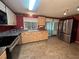 Kitchen with stainless steel appliances and wood cabinets at 1209 Apache Cir, Tavares, FL 32778
