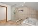 Bathroom with a glass shower, a jacuzzi tub, and modern fixtures at 26348 Se Highway 42, Umatilla, FL 32784