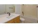 Modern bathroom with a bathtub, vanity, and updated fixtures at 10044 Ballast Dr, Orlando, FL 32827