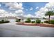Charming single-story home featuring a well-manicured lawn and a welcoming front porch area at 3114 Jemima Ave, The Villages, FL 32163